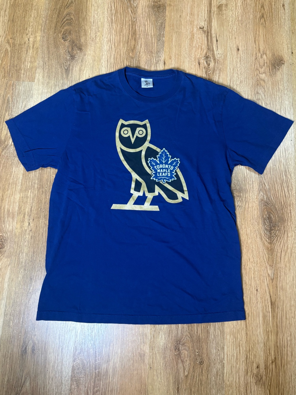 OVO Blue Tee with Gold Owl & Maple Leafs Crest